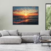 Ocean with birds at sunset